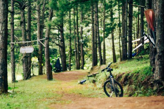 Electric bike battery mounted on frame for off road hill climbing durability