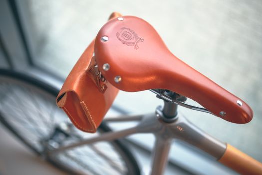Close up of heavy duty U-lock securing eBike frame and wheel to bike rack