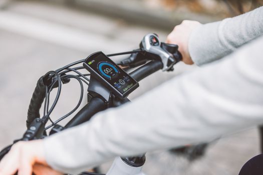Urban commuter ebike motor cutting out on a sunny park trail