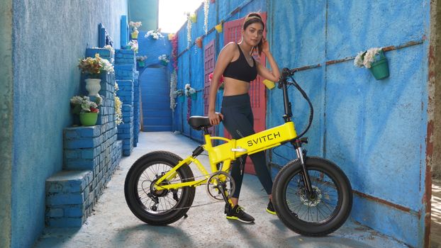 Electric motorcycle battery pack close-up in hot Indian sunlight, best electric bike in India 2025 durability warning