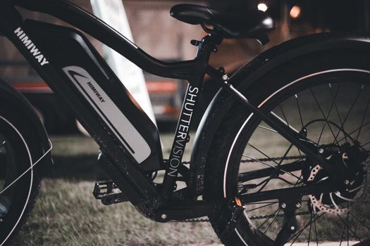 Rear hub motor e-bike wheel installed with torque arm on dropout